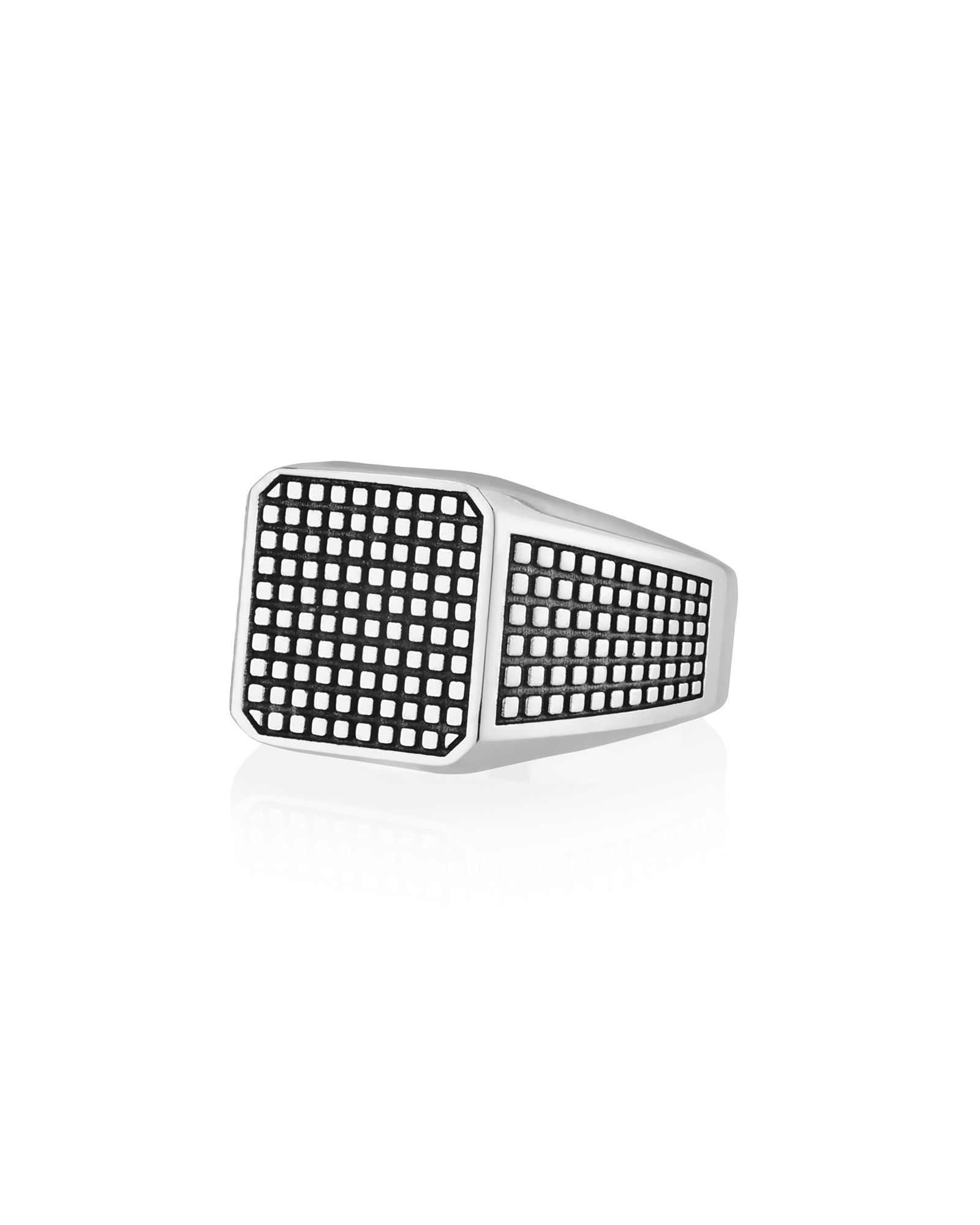 mid-century modern style silver signet ring with soft square shape and polka dot texture on top and sides.