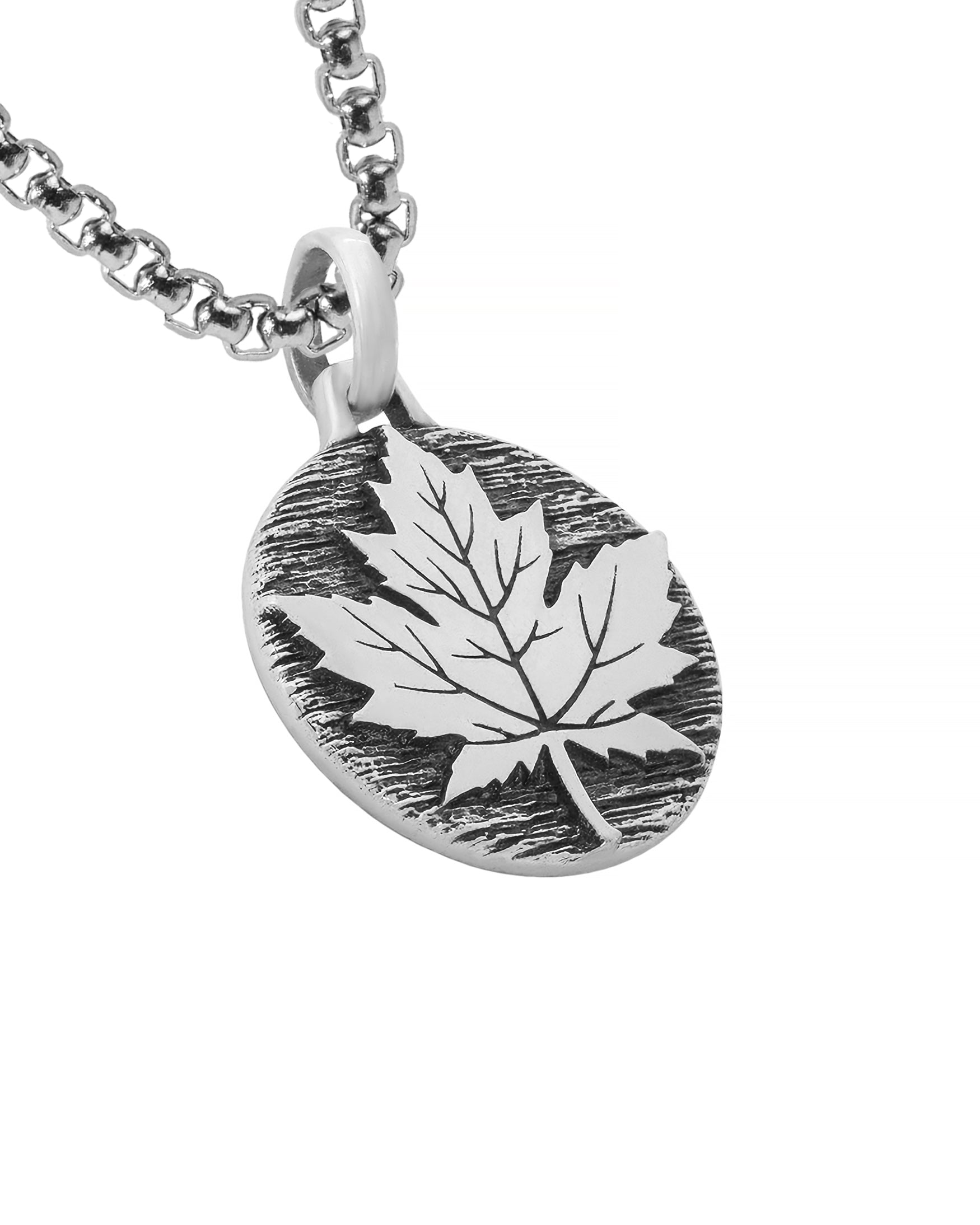 Round Pendant with Maple Leaf on Tree Bark Silver