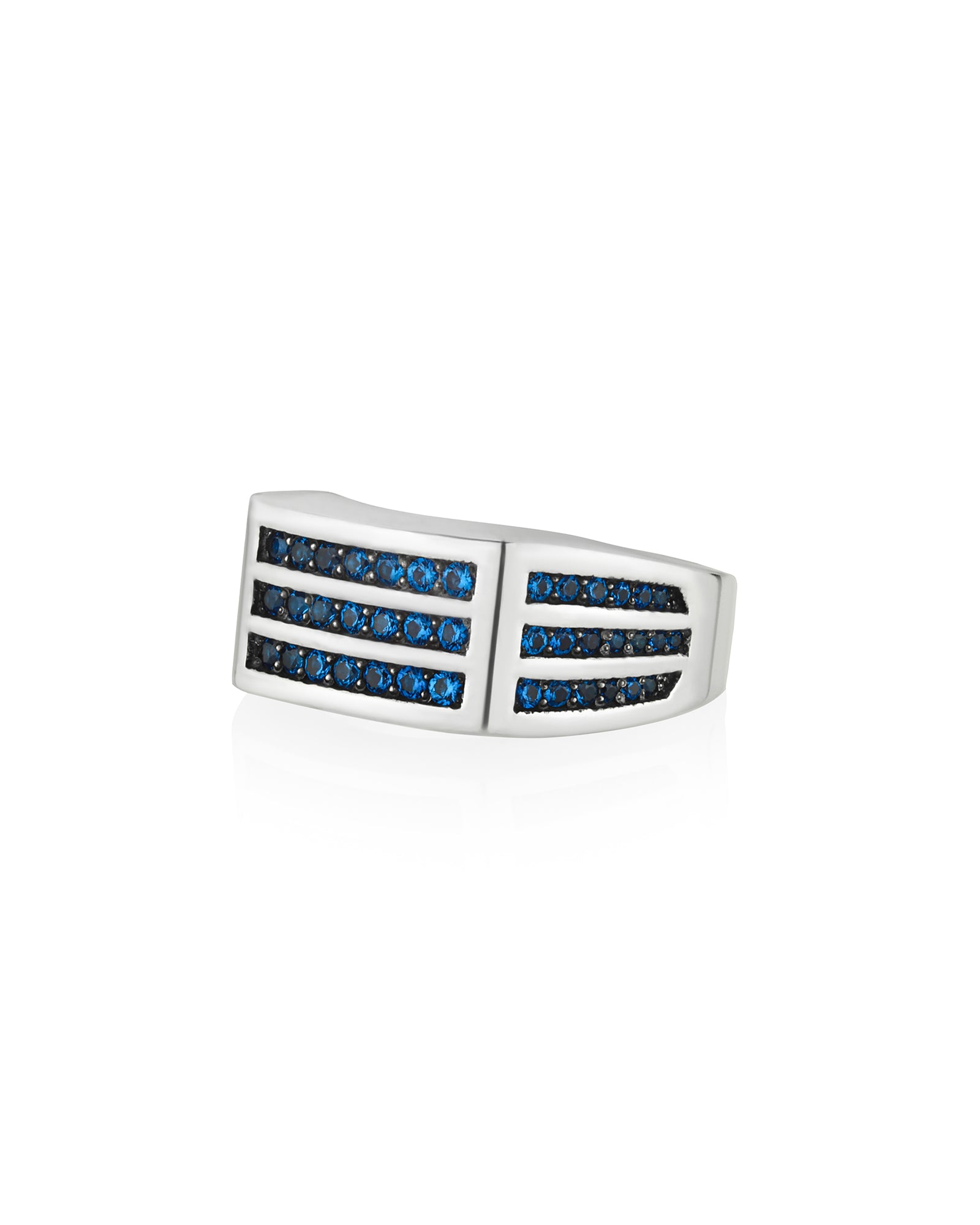 silver rectangular signet ring with channel set of sapphire-like dark blue stones in grooved design.