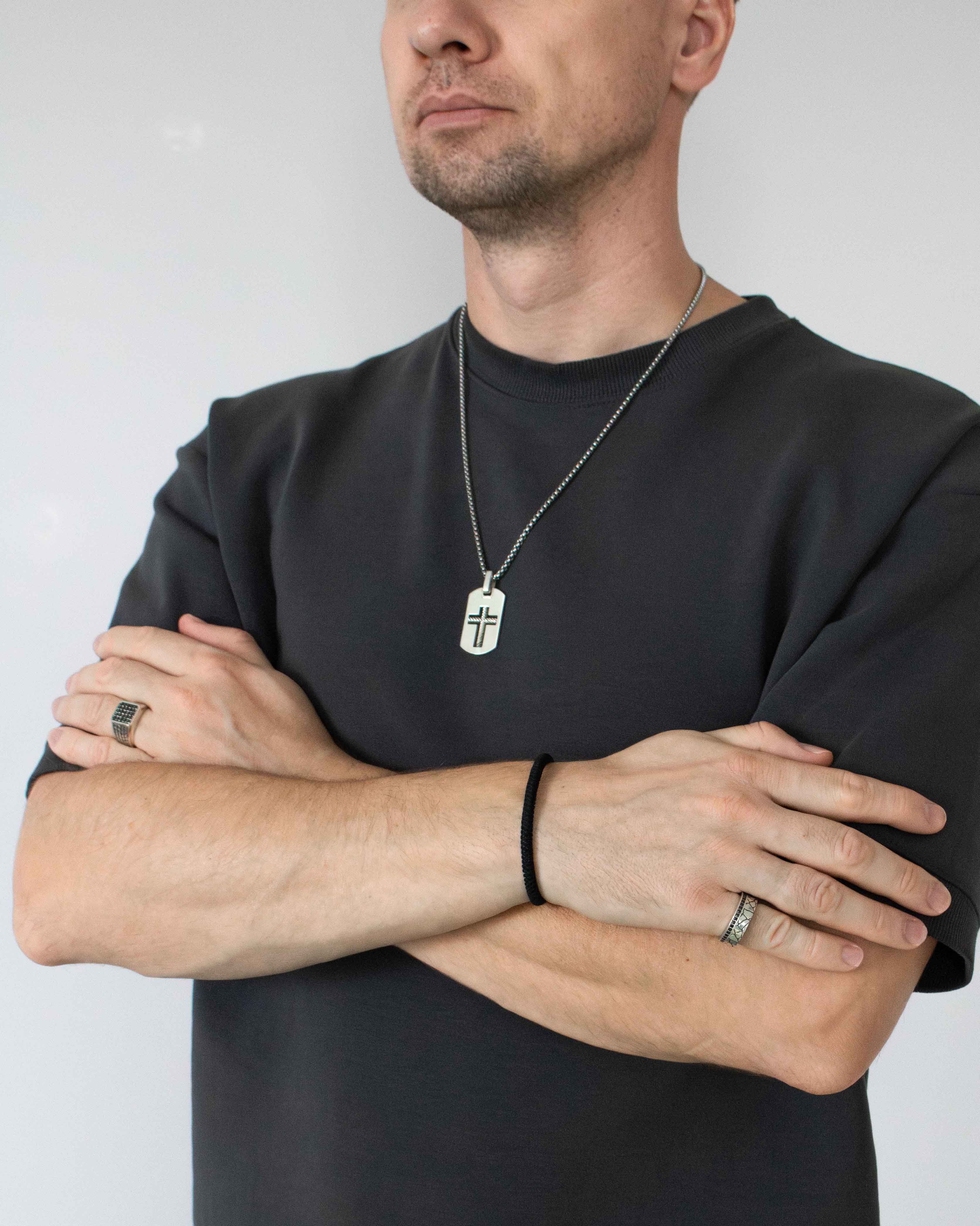 Men's Pendant with a Carved Cross in a Twisted Design